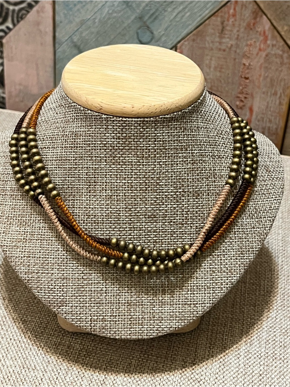 Multi-Strand Bronze Bead and Earth-Tone Cord Necklace